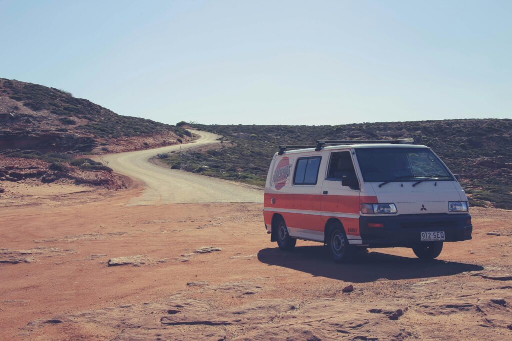 4WD traversing remote outback terrain during one of the best road trips in Australia