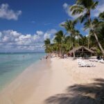 A luxurious all-inclusive resort in the Caribbean featuring turquoise waters, and pristine white sand beaches