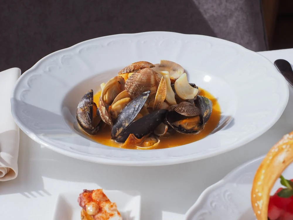 Hearty Bouillabaisse fish stew with seafood and rouille sauce, showcasing the best local food in France