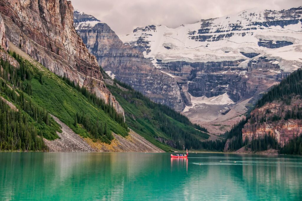 a peaceful lake, showcasing the natural beauty of the best places to visit in Canada