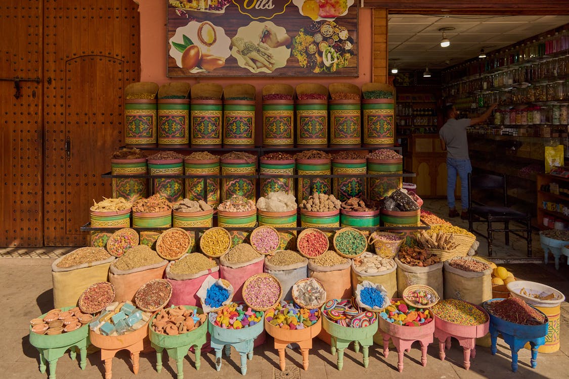 Vibrant spice pyramids showcasing the best local foods to try in Morocco