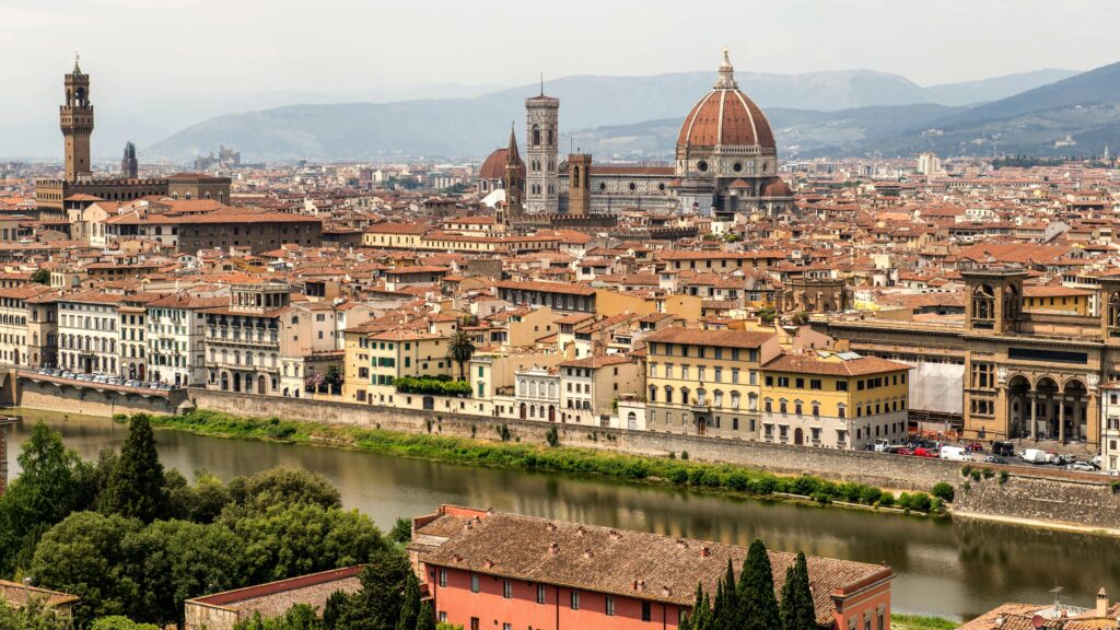 July holiday destinations - Florence cityscape with Duomo and historic architecture