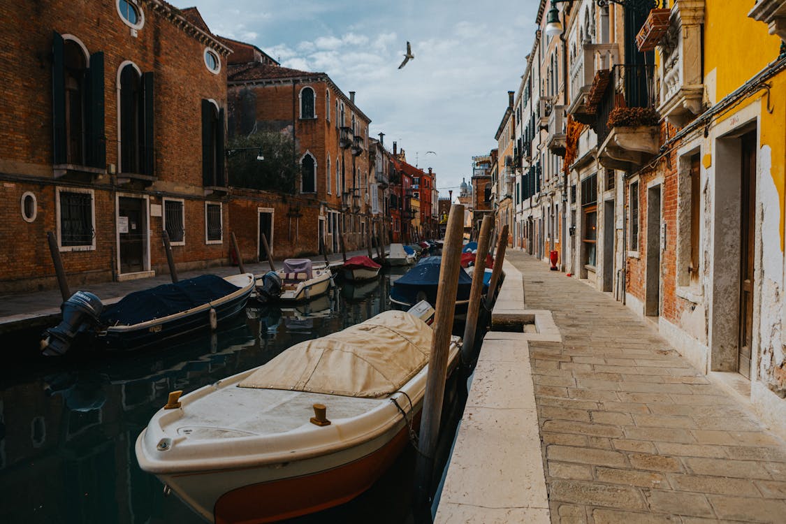 Boats Docked on the Venice River, Italy in autumn