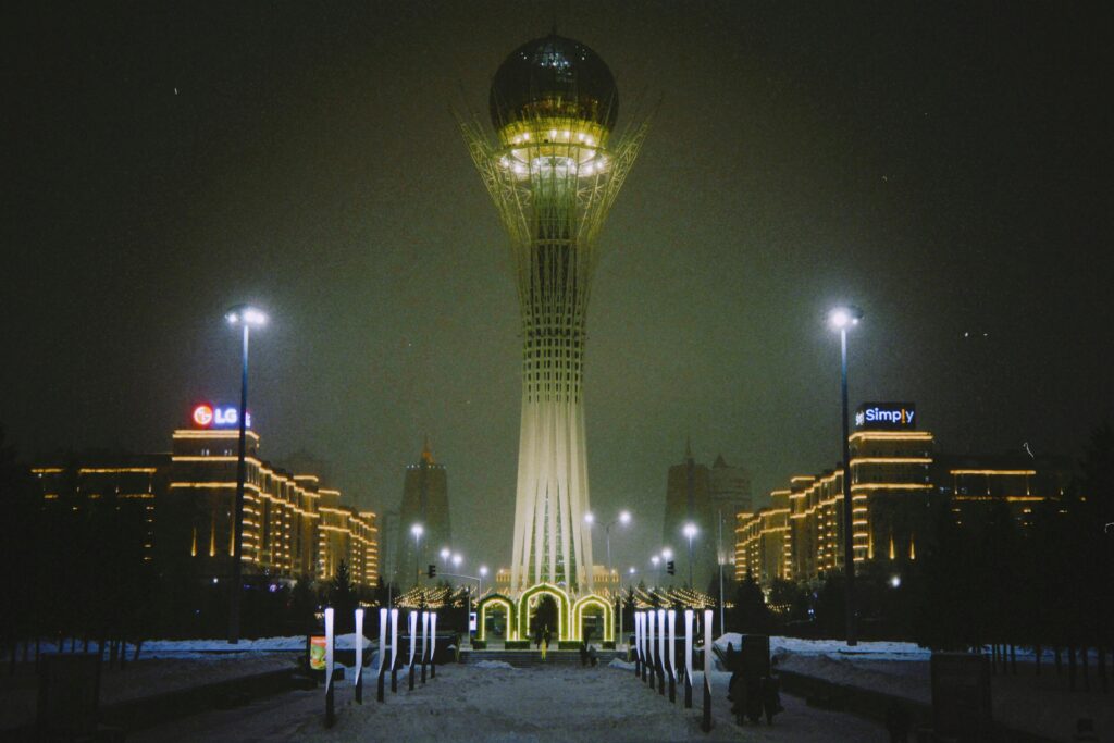 Illuminated Bayterek Tower in Nur-Sultan, a must-see among the best places to visit in Kazakhstan