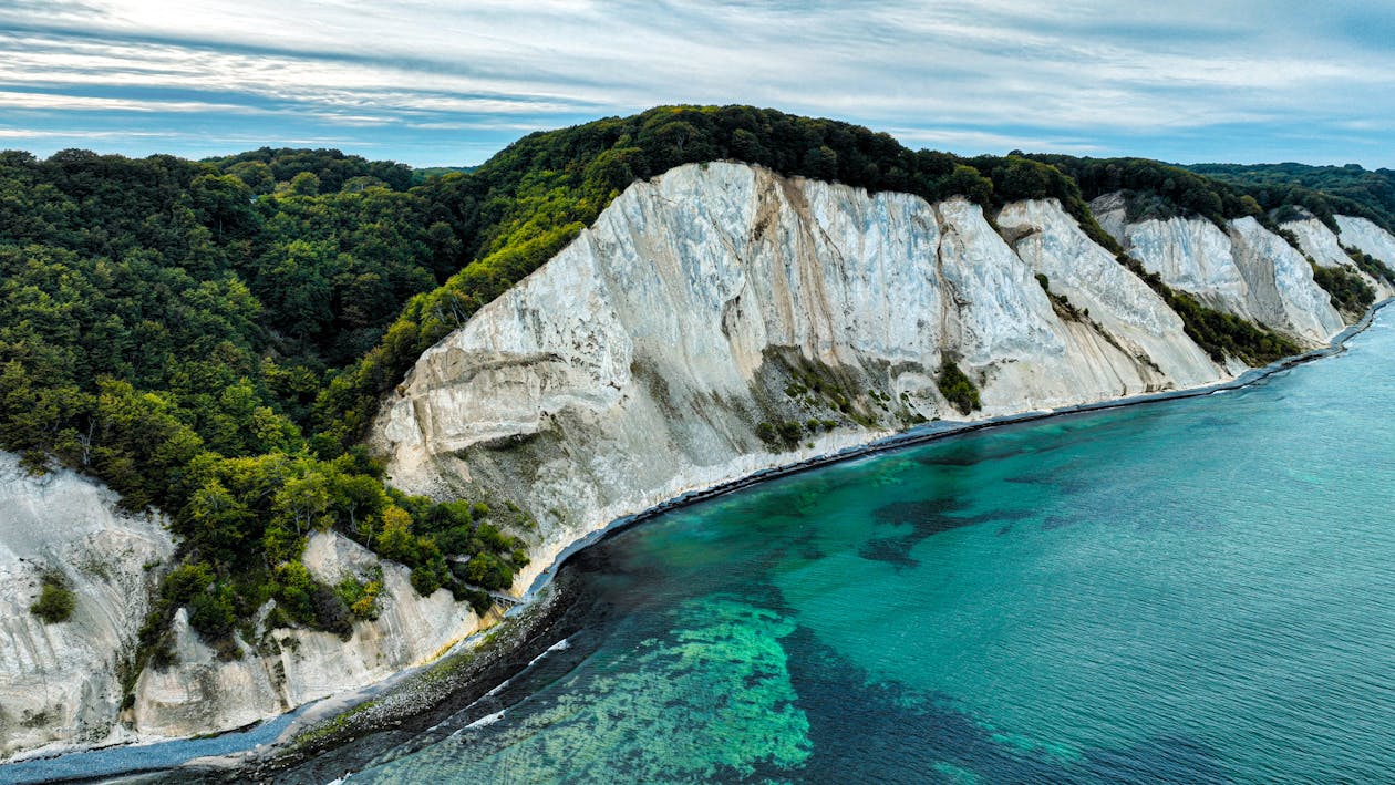 Best places to visit in Denmark - The dramatic white chalk cliffs of Møns Klint rising from the Baltic Sea