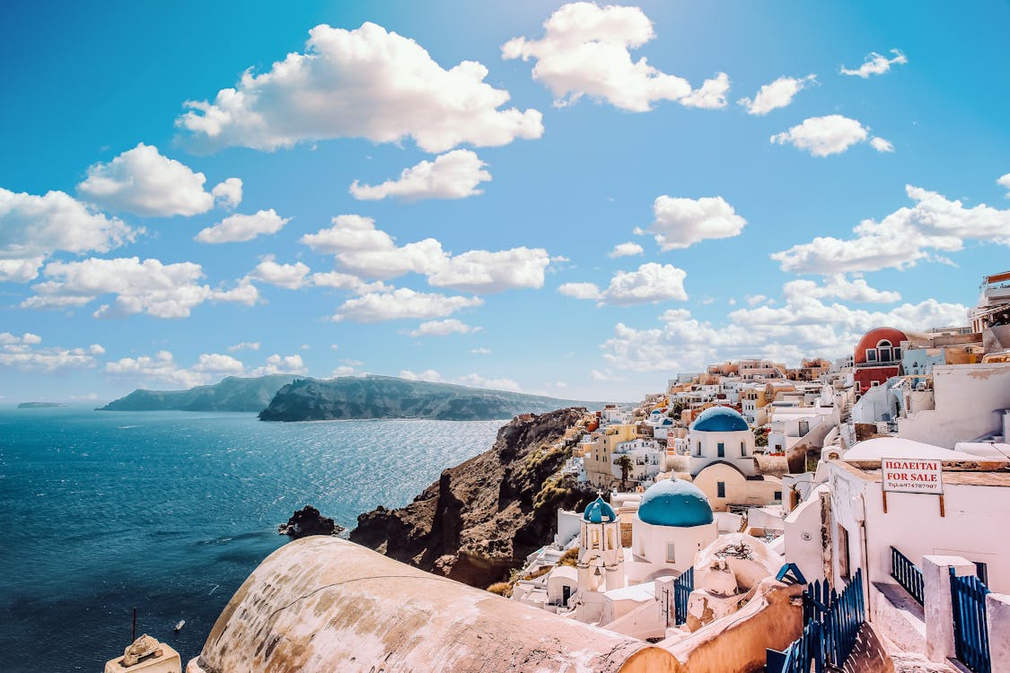 October travel destinations - Santorini's stunning views with perfect autumn weather