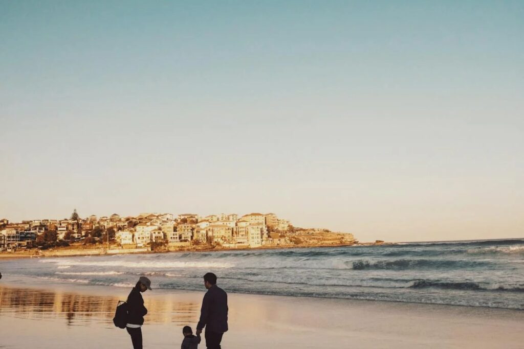 Travelers enjoying sunset during one of the best road trips in Australia
