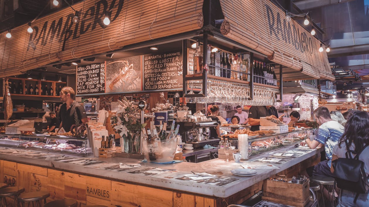 What to do in Barcelona that tourists miss - Traditional vermut ritual with tapas at local bar