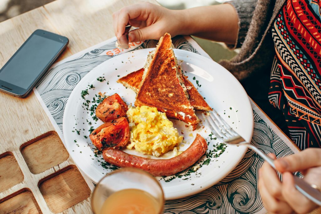 Solo traveler enjoying local cuisine during first solo trip to South America