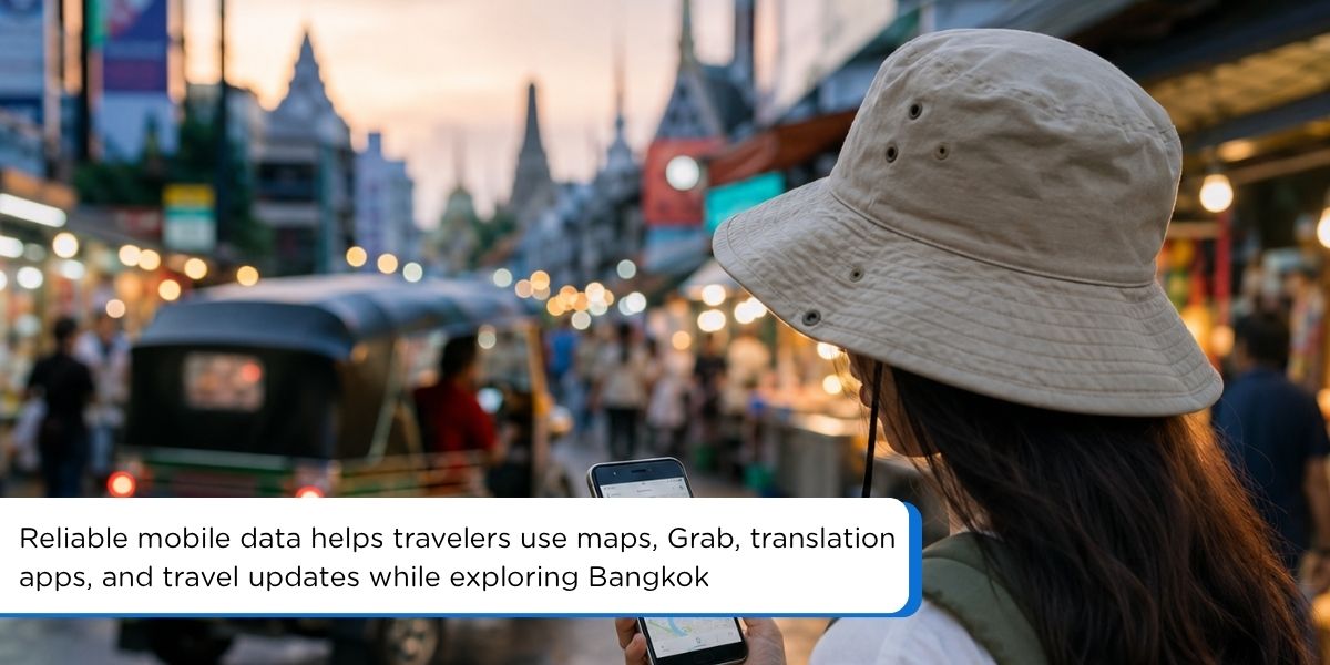 Traveler using mobile data on a smartphone while exploring Bangkok with Gohub Thailand eSIM