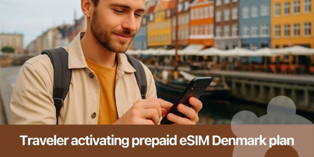 Traveler activating prepaid eSIM Denmark plan on smartphone in Copenhagen