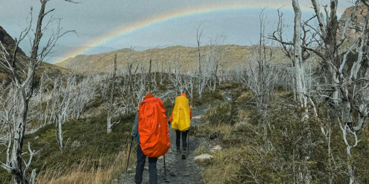 Backpackers hiking the W Trek trail in Torres del Paine National Park Patagonia Chile