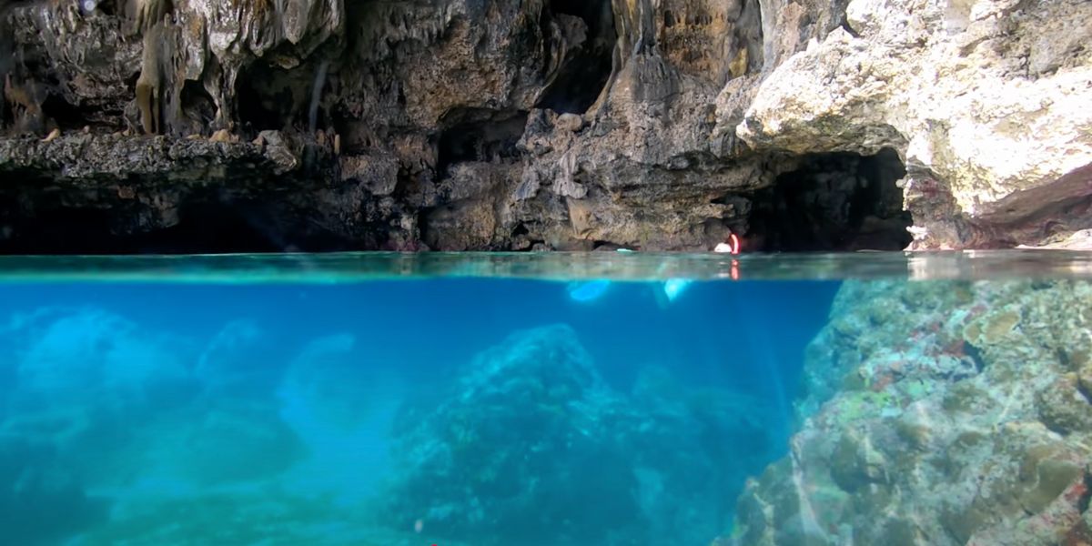 Limestone cave pool along the coast of Niue Island in Polynesia.