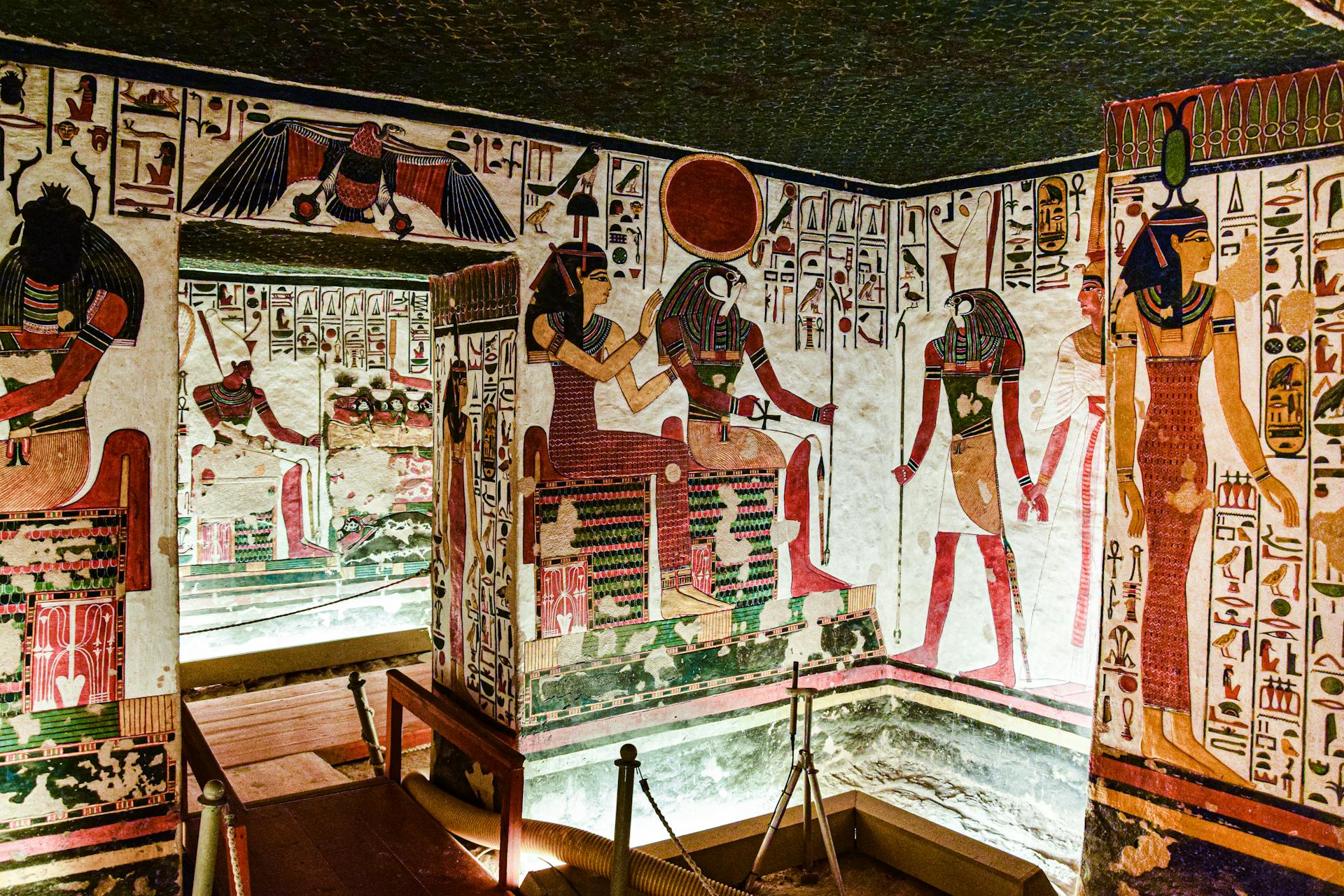 Colorful ancient wall paintings inside a tomb at Valley of the Kings in Luxor