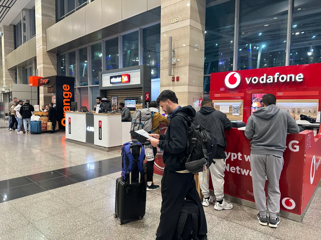 Vodafone and Orange SIM card kiosk at Cairo International Airport